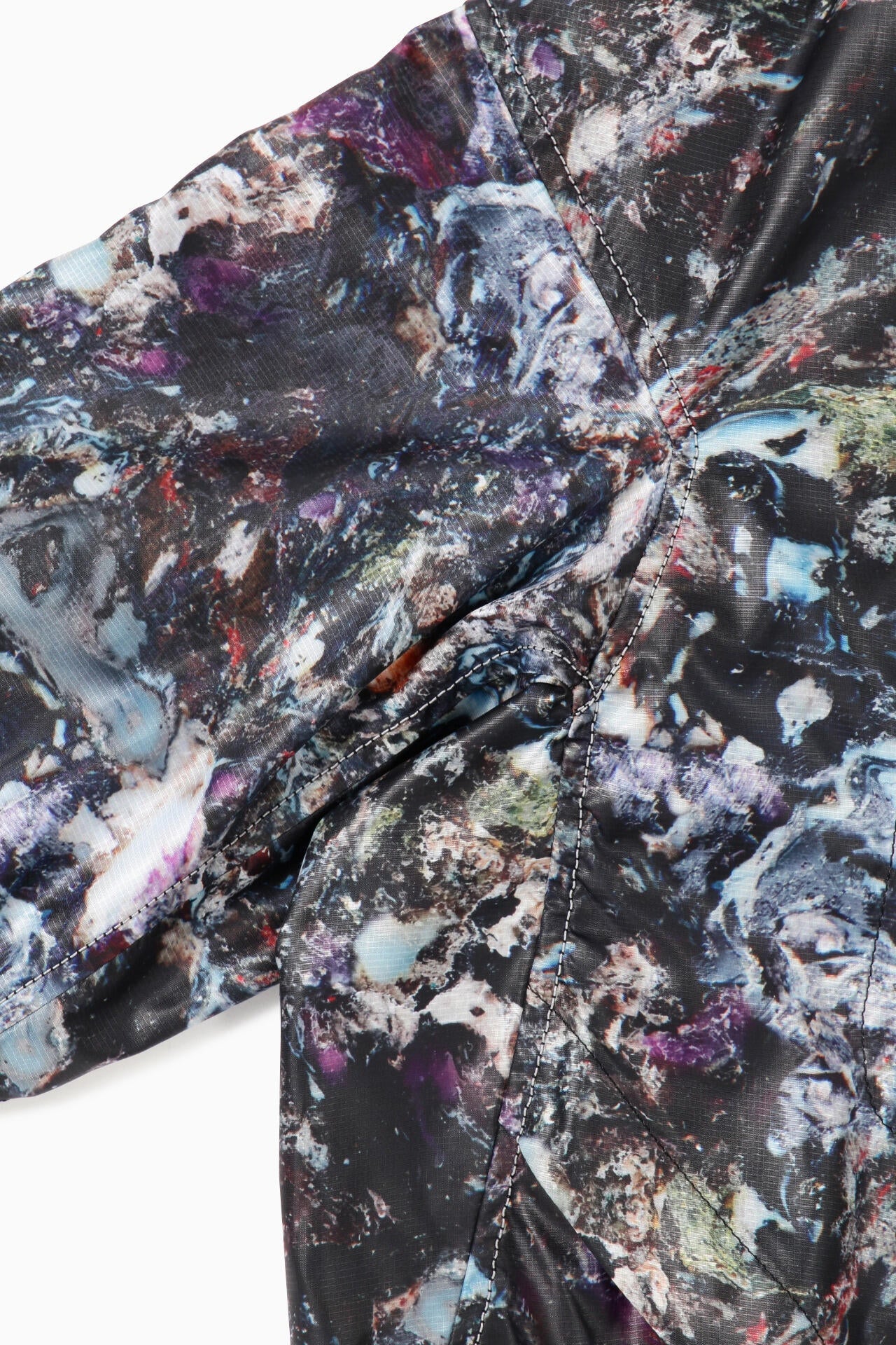 stone printed rip coat