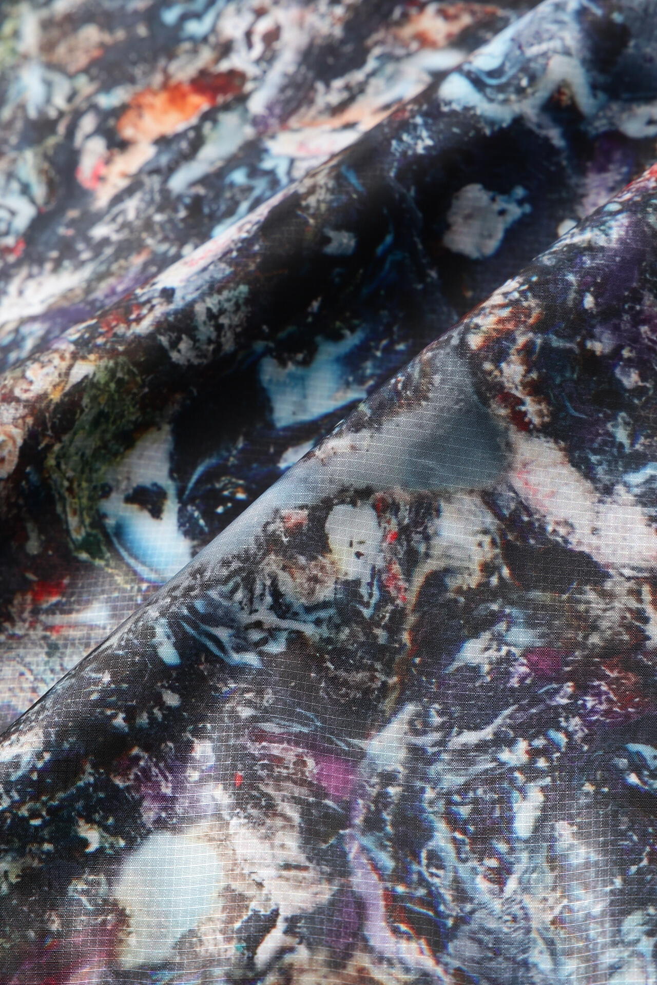 stone printed rip coat