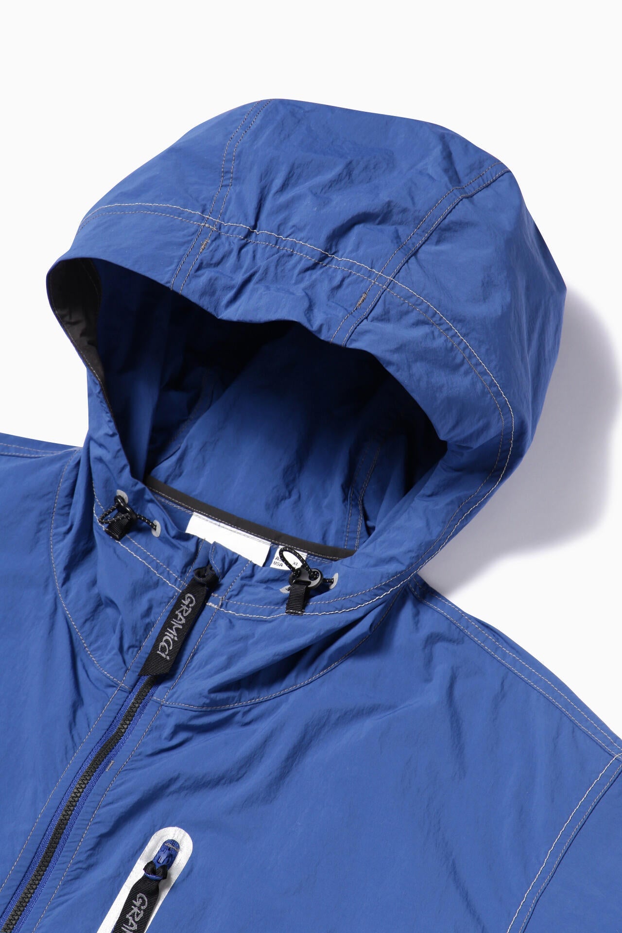 GRAMICCI × and wander brushed nylon jacket