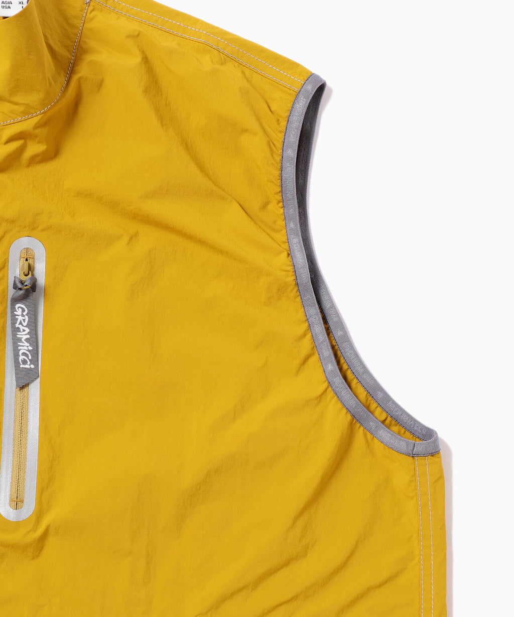 Gramicci × and wander  brushed nylon vest
