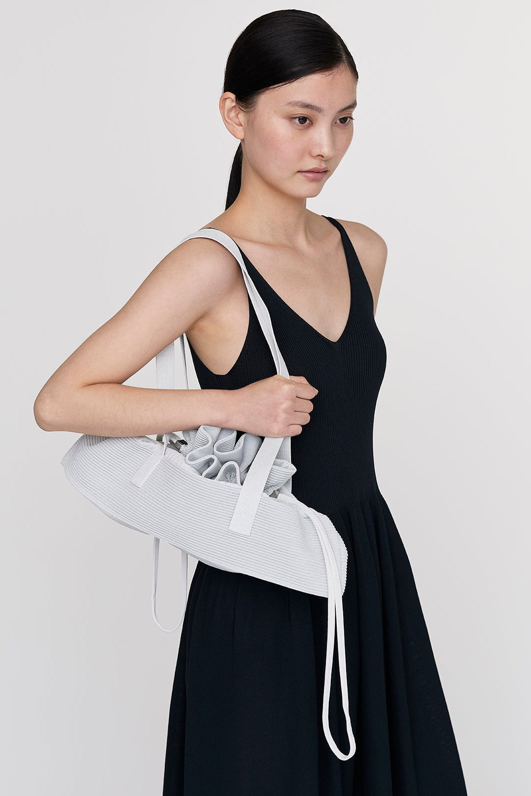 STRATUM GLITTER ELONGATED BAG