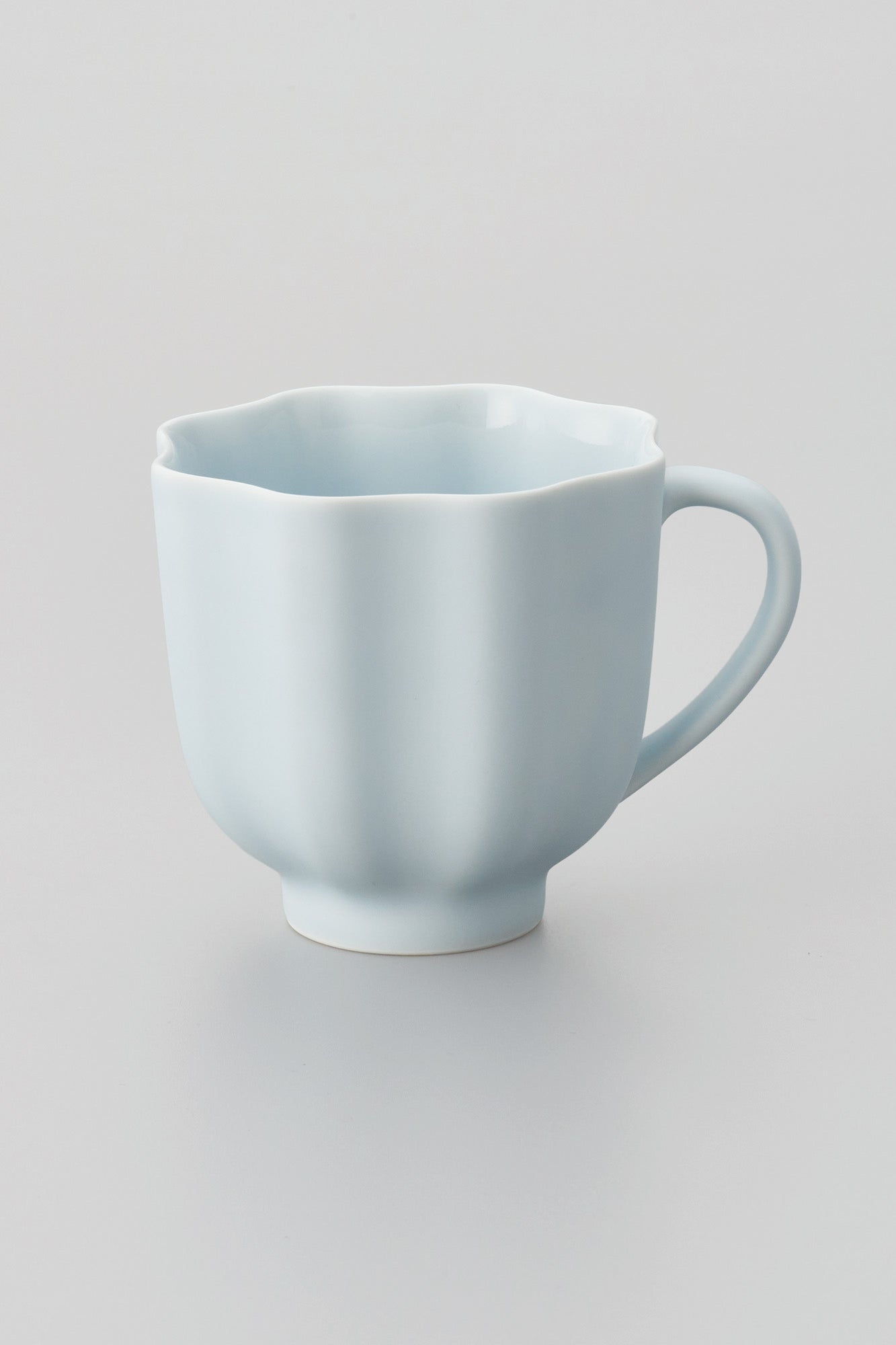 PORCELAIN POTTERY TEA MUG - OPALIN BLUE