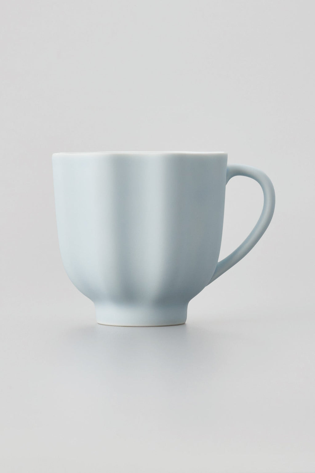 PORCELAIN POTTERY TEA MUG