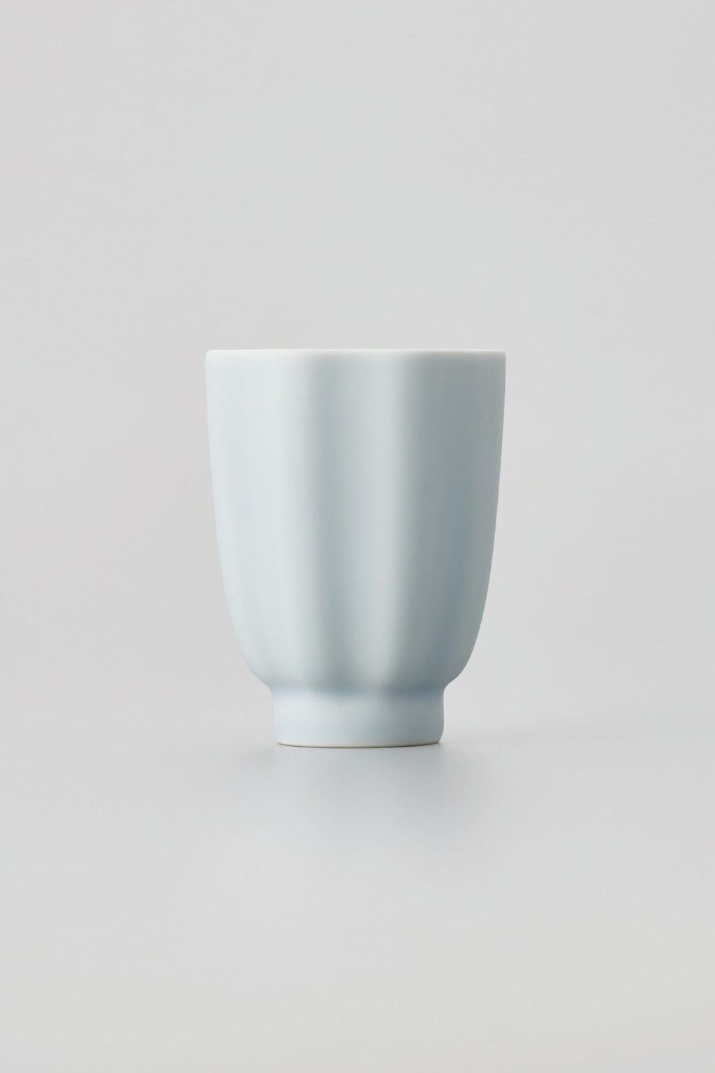 PORCELAIN POTTERY TEA CUP