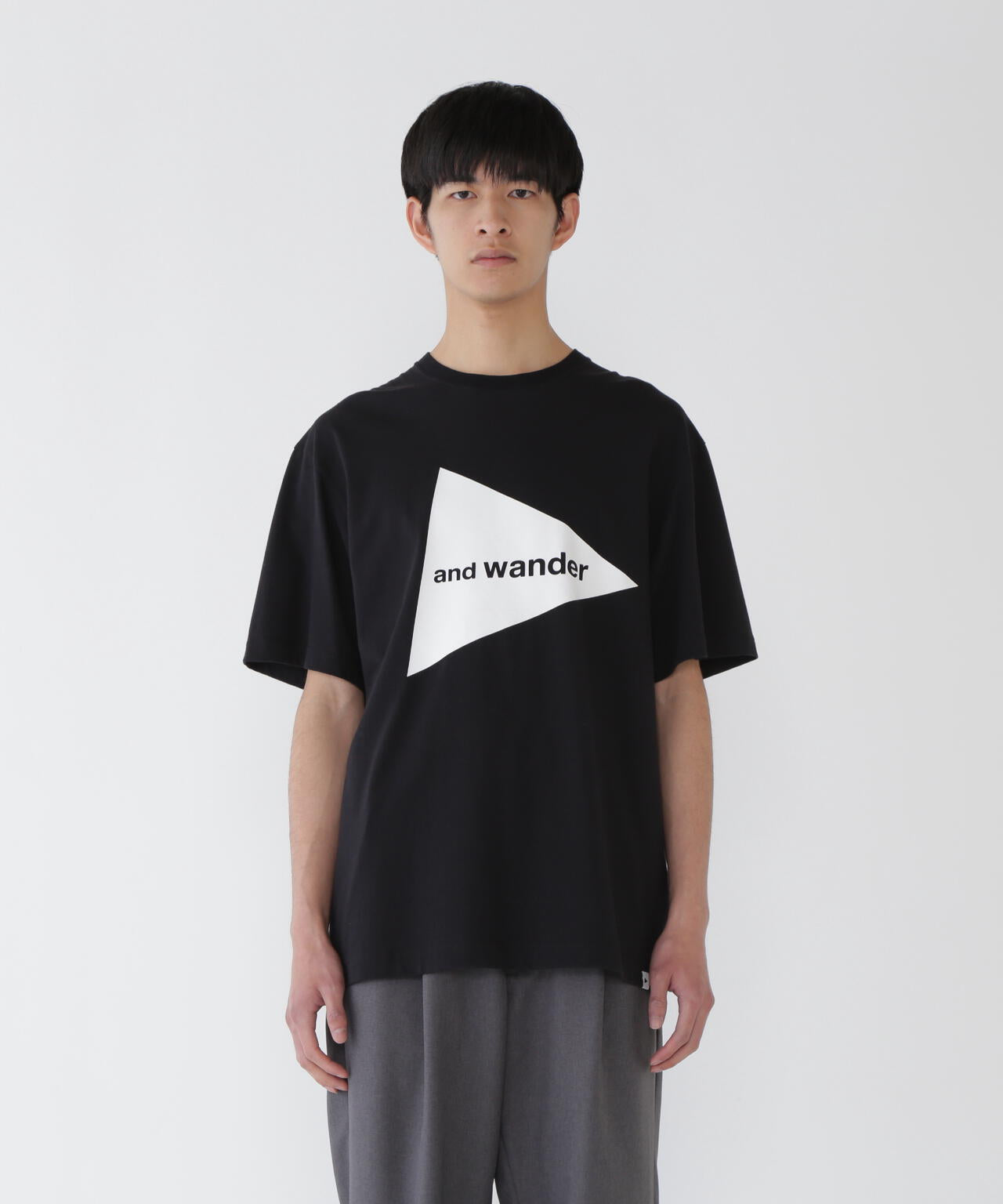 and wander logo SS T