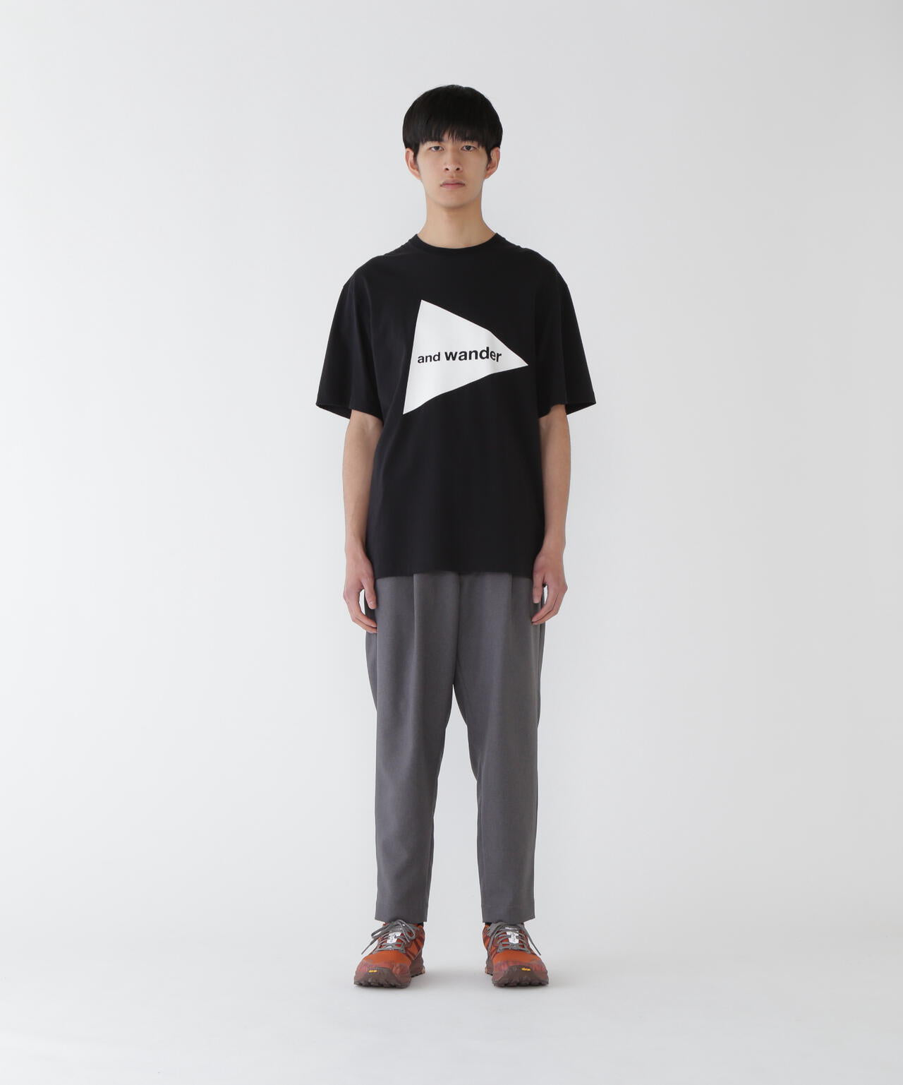 and wander logo SS T