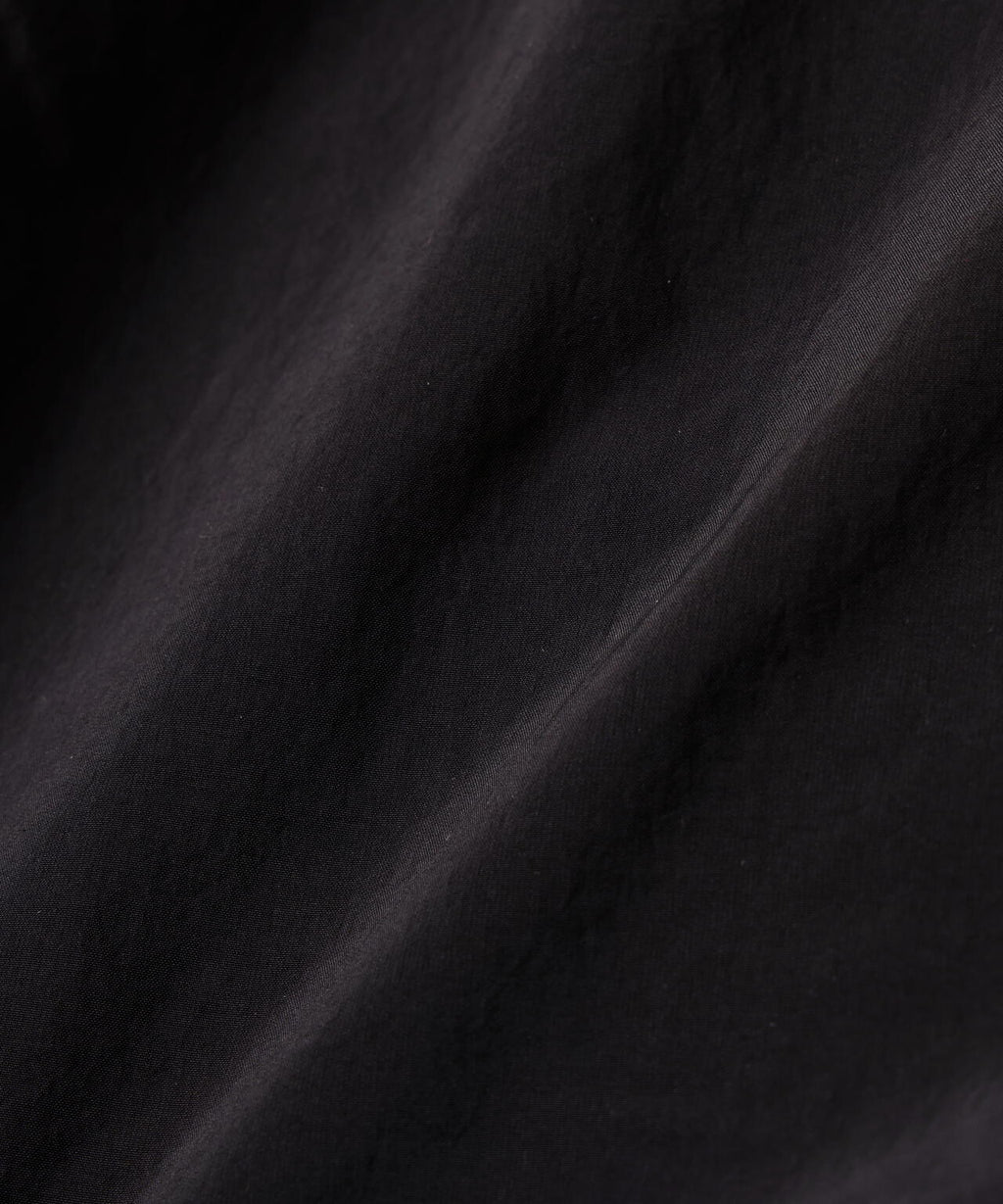 Gramicci × and wander brushed nylon jacket