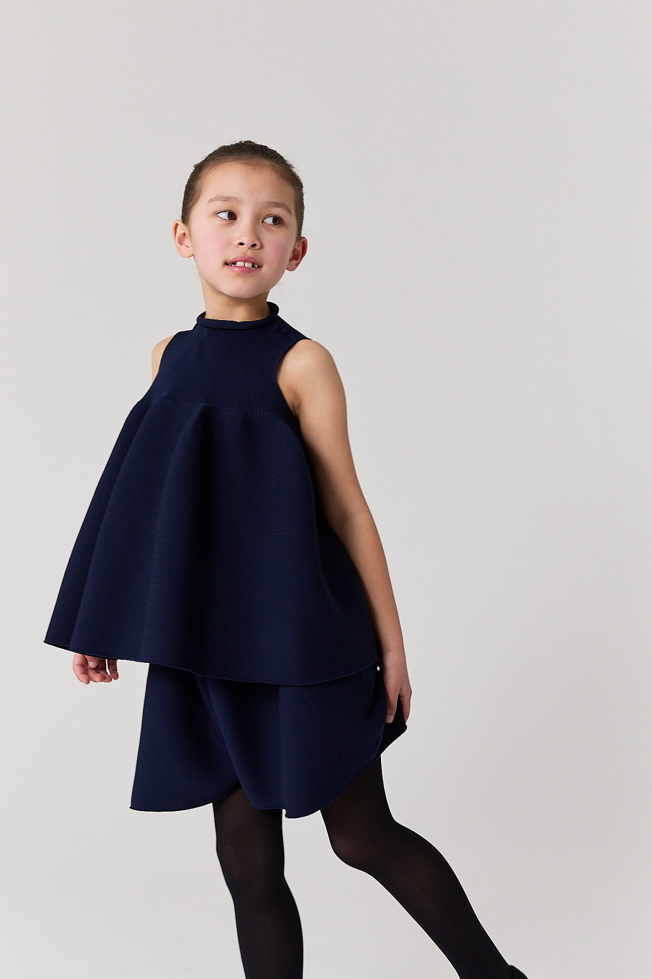 POTTERY KIDS SLEEVELESS BUST FLARE TOP