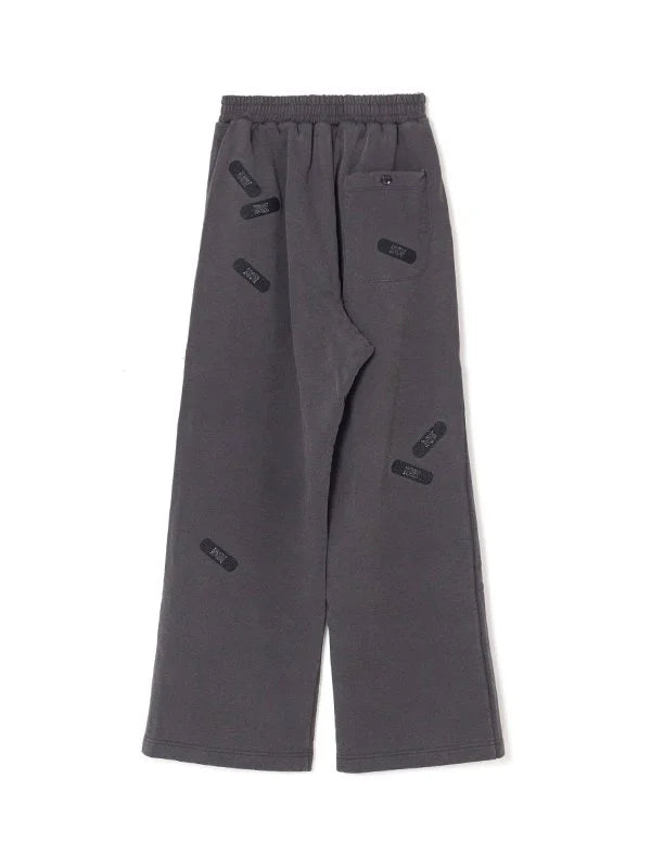 BANDAGE EMBROIDERY SWEAT PANTS