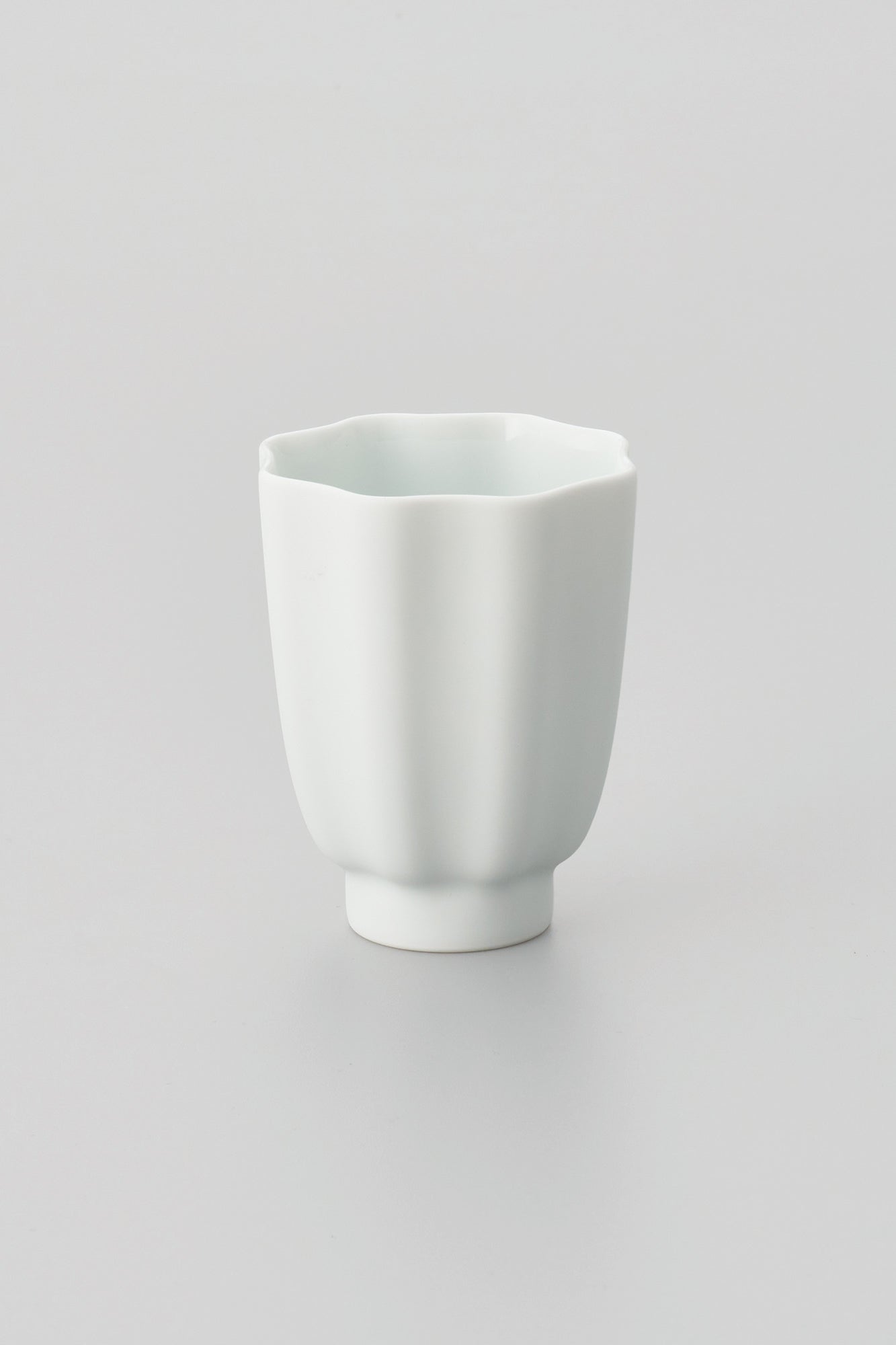 PORCELAIN POTTERY TEA CUP - WHITE
