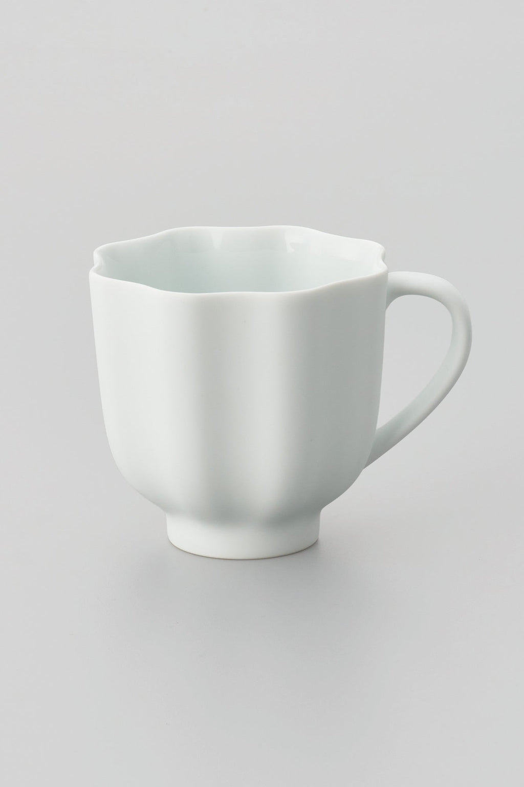 PORCELAIN POTTERY TEA MUG - WHITE