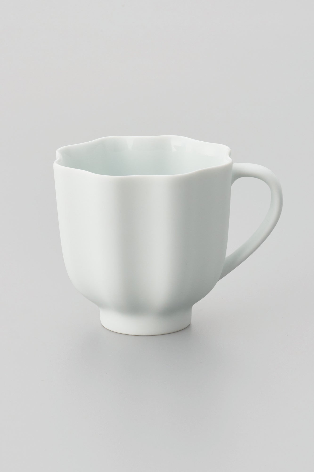 PORCELAIN POTTERY TEA MUG - WHITE