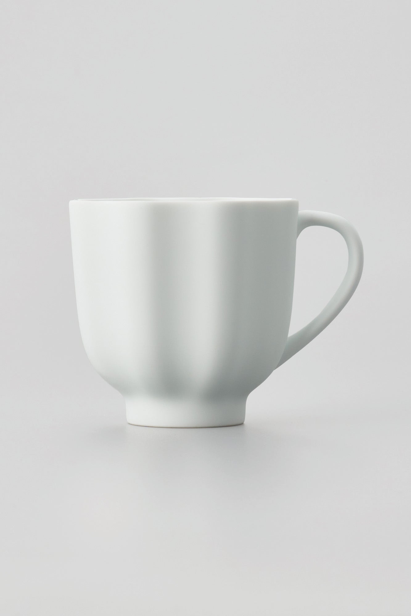 PORCELAIN POTTERY TEA MUG