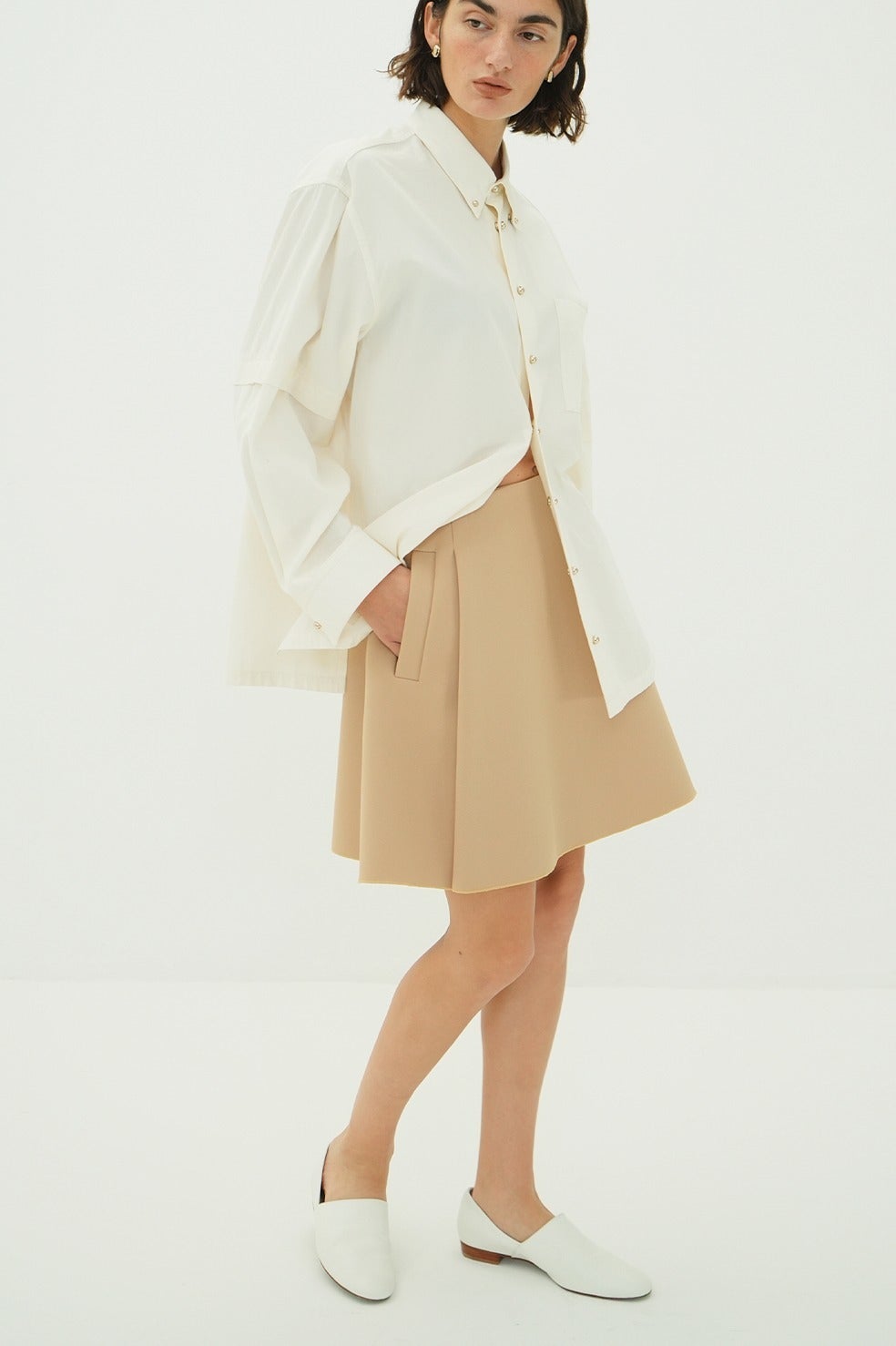 LOW WAIST FLARE MINI SKIRT