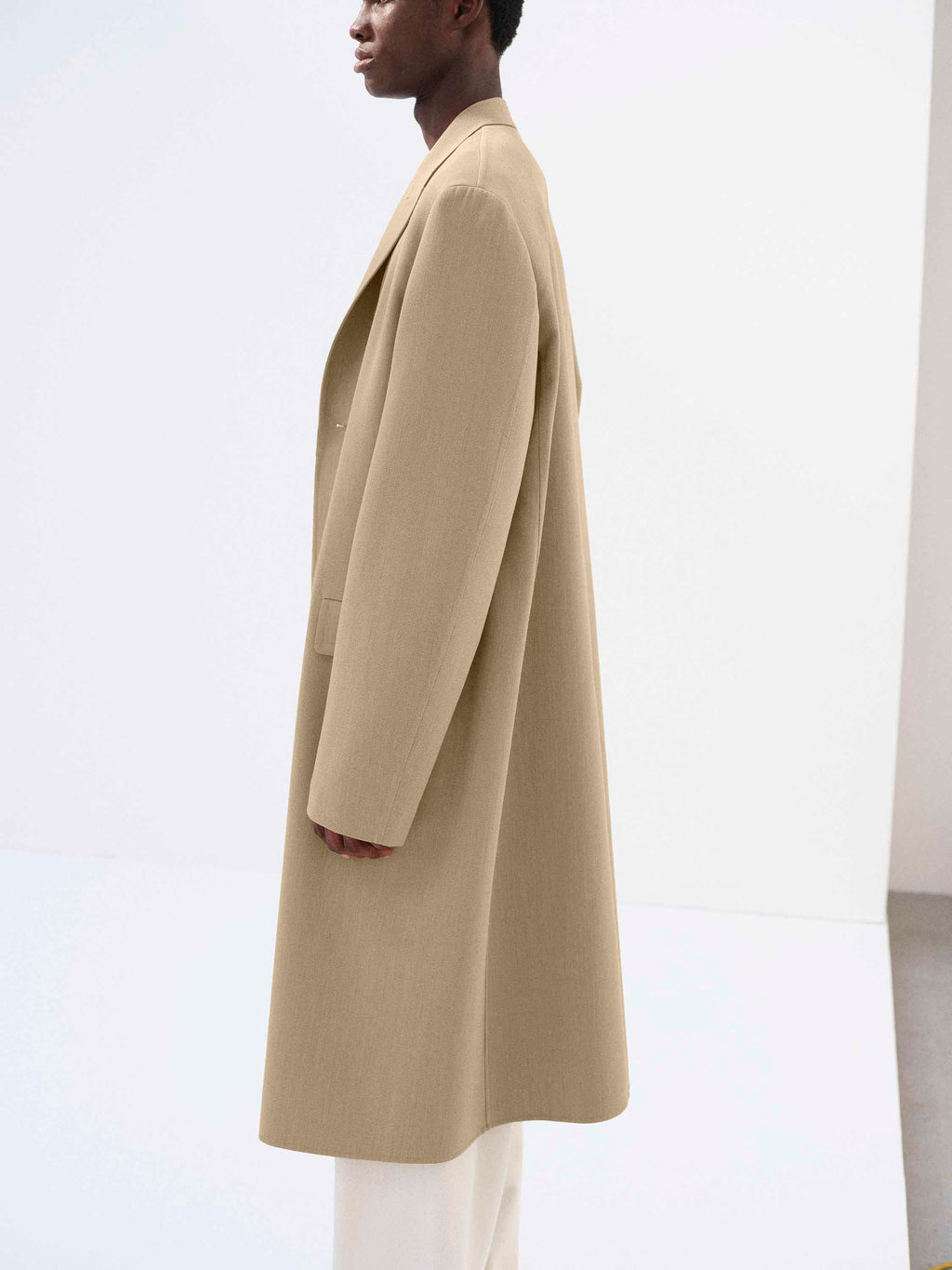 STRUCTURED WOOL GABARDINE HAND SEWN COAT