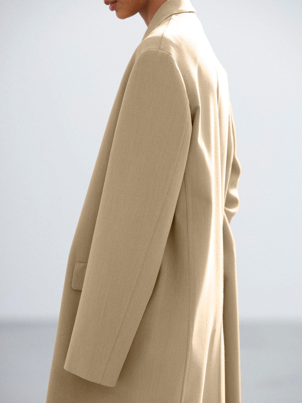STRUCTURED WOOL GABARDINE HAND SEWN COAT